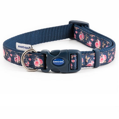An Ancol dog collar in navy with small pink roses on it. It has a blue plastic clasp with Ancol written in white.