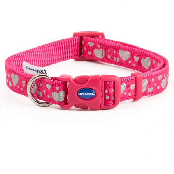 An Ancol dog collar in pink with small pink hearts on it. It has a pink plastic clasp with Ancol written in white.